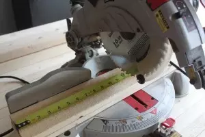 After you determine the size that fits your space, cut the boards using a chop saw. 
