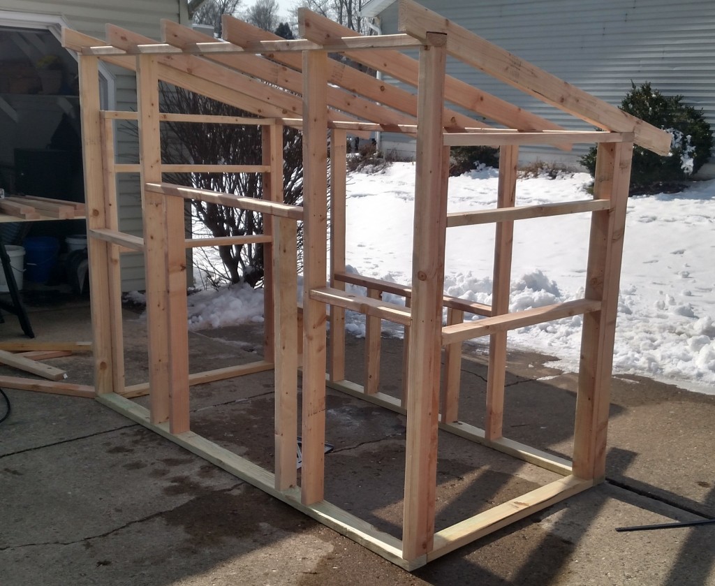 The coop frame in the driveway - just like we did five years ago!