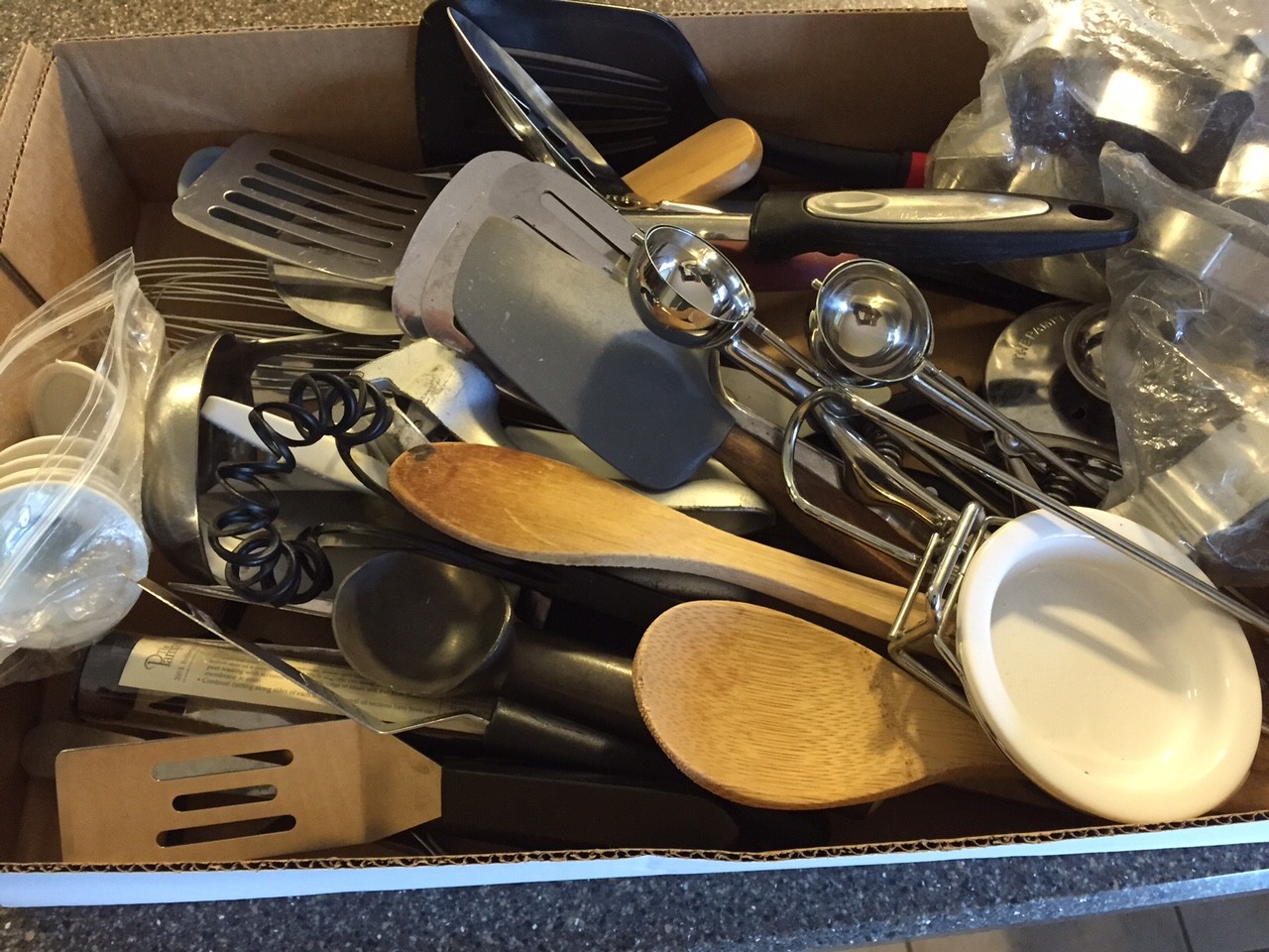 The extra kitchen utensils found as we cleaned out the cupboards