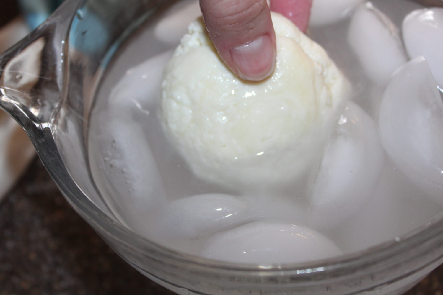 After forming the cheese into a ball, place in ice water to cool. 