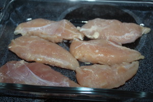 Pound chicken breasts until even. 