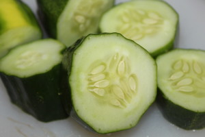 Cut cucumbers into small chunks before placing them in the food processor