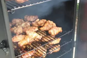 Racks of wings cooking low and slow.