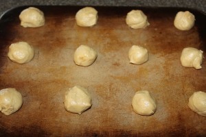 Roll dough into balls and place on a baking sheet