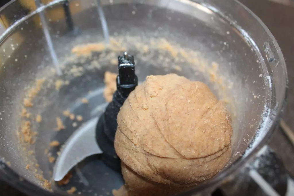 After a few minutes the ingredients will form a dough ball. 