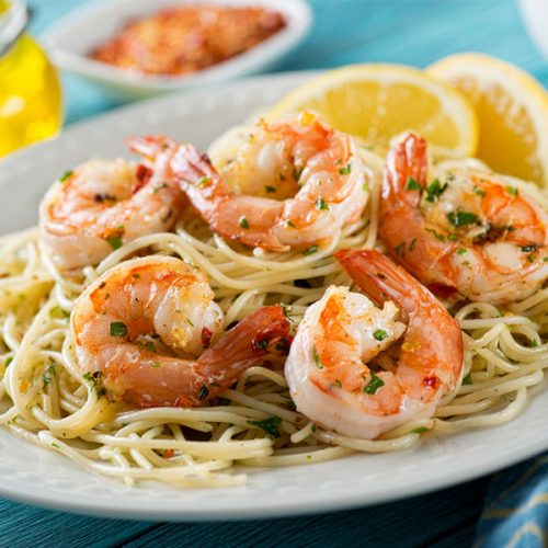 Shrimp Scampi Recipe - Garlic Butter Shrimp Served Over Pasta