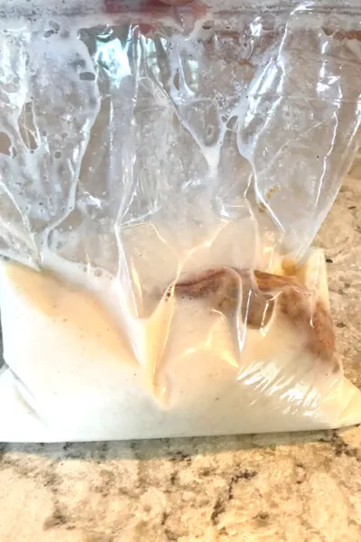 chicken soaking in buttermilk