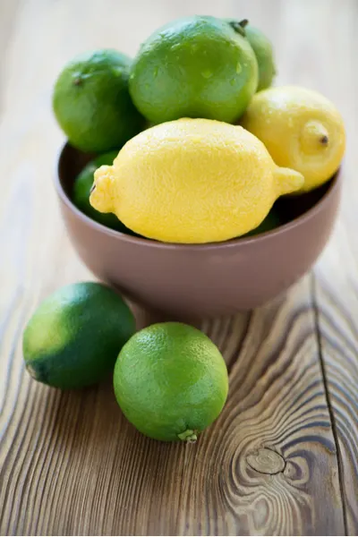 lemon and limes in bowl 