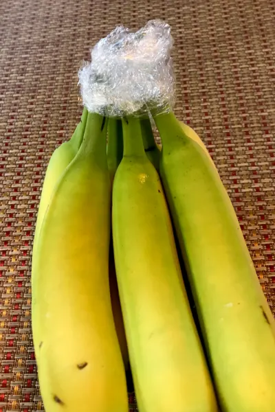 plastic on banana stems 