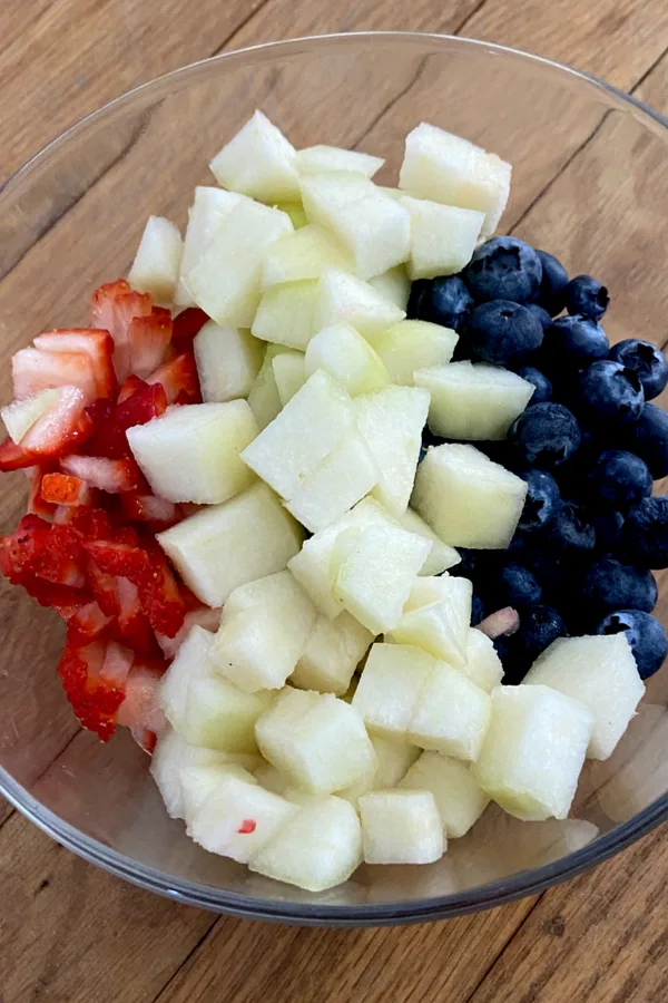 red white and blue fruit in a bowl