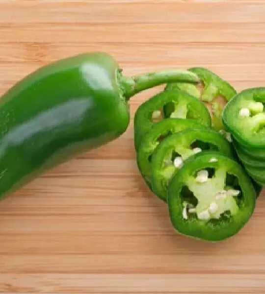 whole and sliced jalapeno pepper