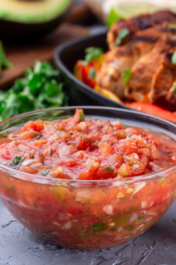 homemade salsa in glass bowl