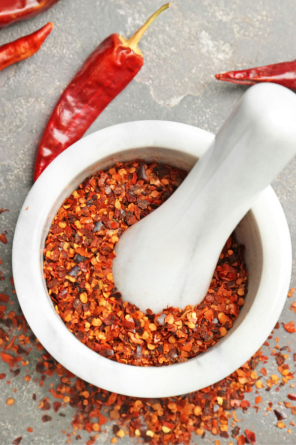 grinding hot pepper flakes