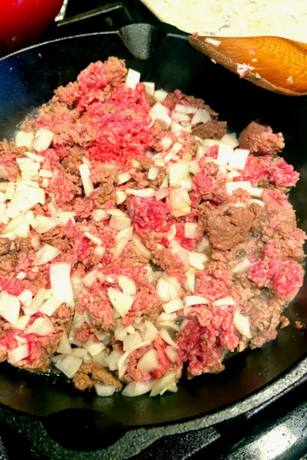 ground beef and onions sautéing 