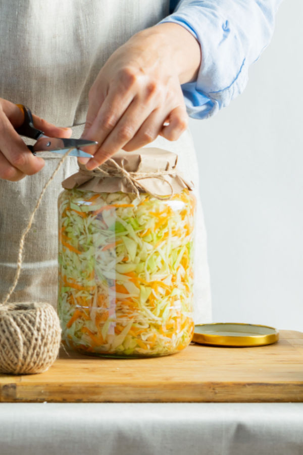 covering mason jar with loose fitting cloth
