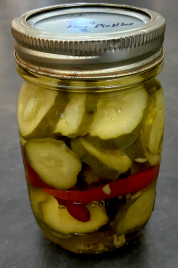 spicy and hot pickles in a mason jar