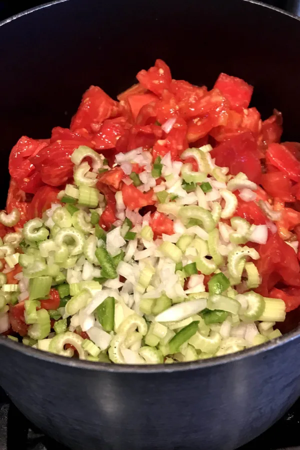 diced vegetables in a large pot