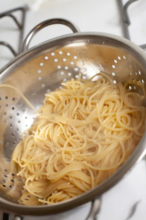 drained spaghetti noodles
