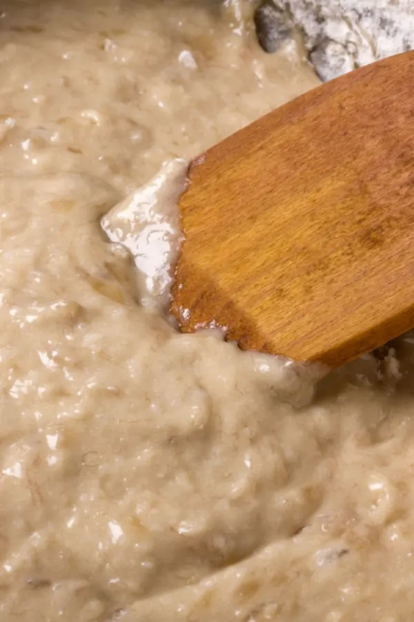 wooden spatula stirring batter