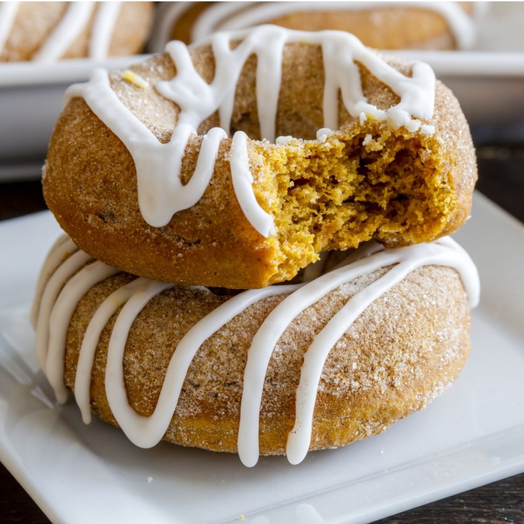 homemade pumpkin donuts with icing