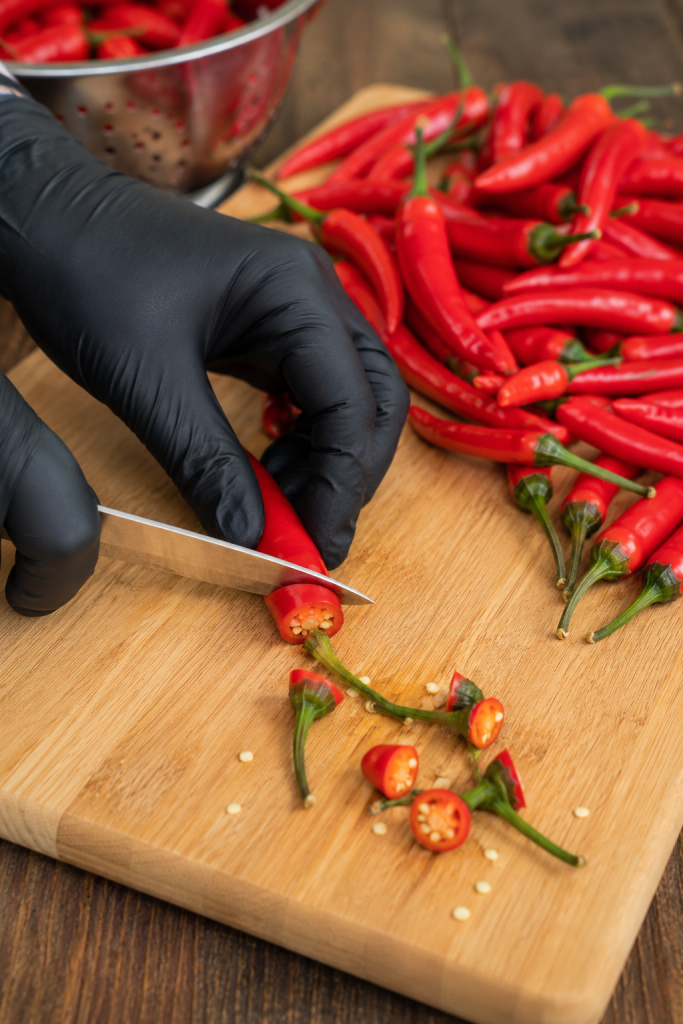 cutting peppers with gloves